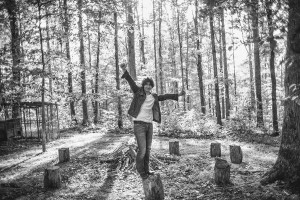 Gooding balancing on stump